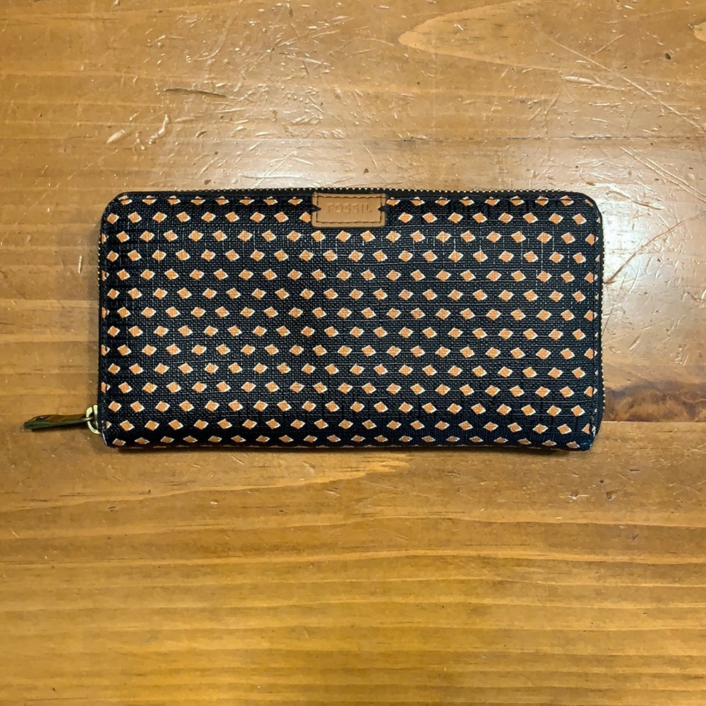 A Fossil zip wallet